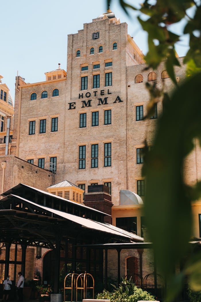 services-03 Exterior view of the historic and iconic Hotel Emma in San Antonio, Texas.